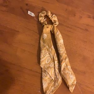 A cute francesca’s scrunchy hair piece!